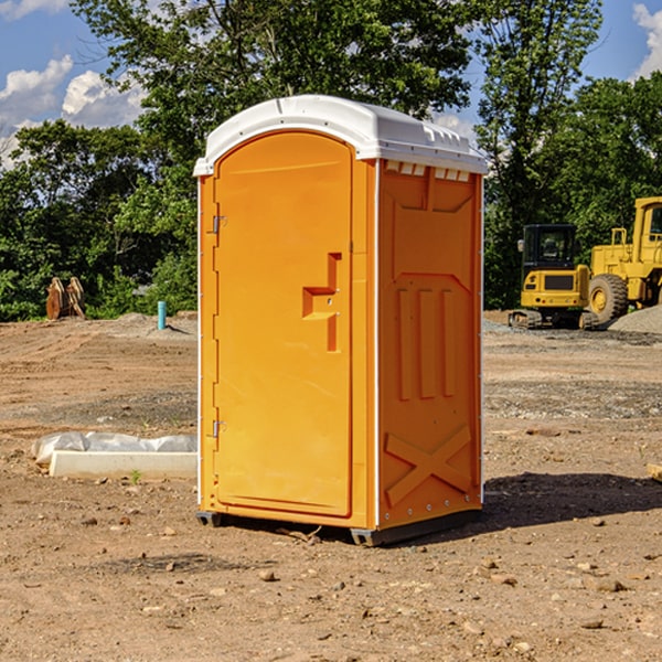 how often are the portable restrooms cleaned and serviced during a rental period in Milton